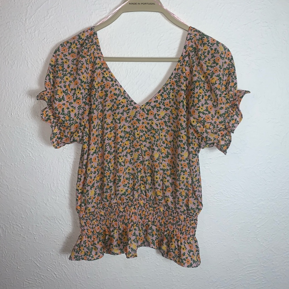 light pink floral blouse